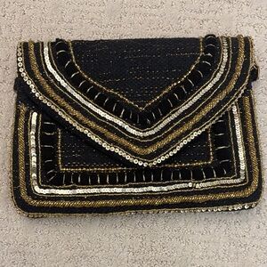 America & beyond Elegant Black and Gold Clutch. New